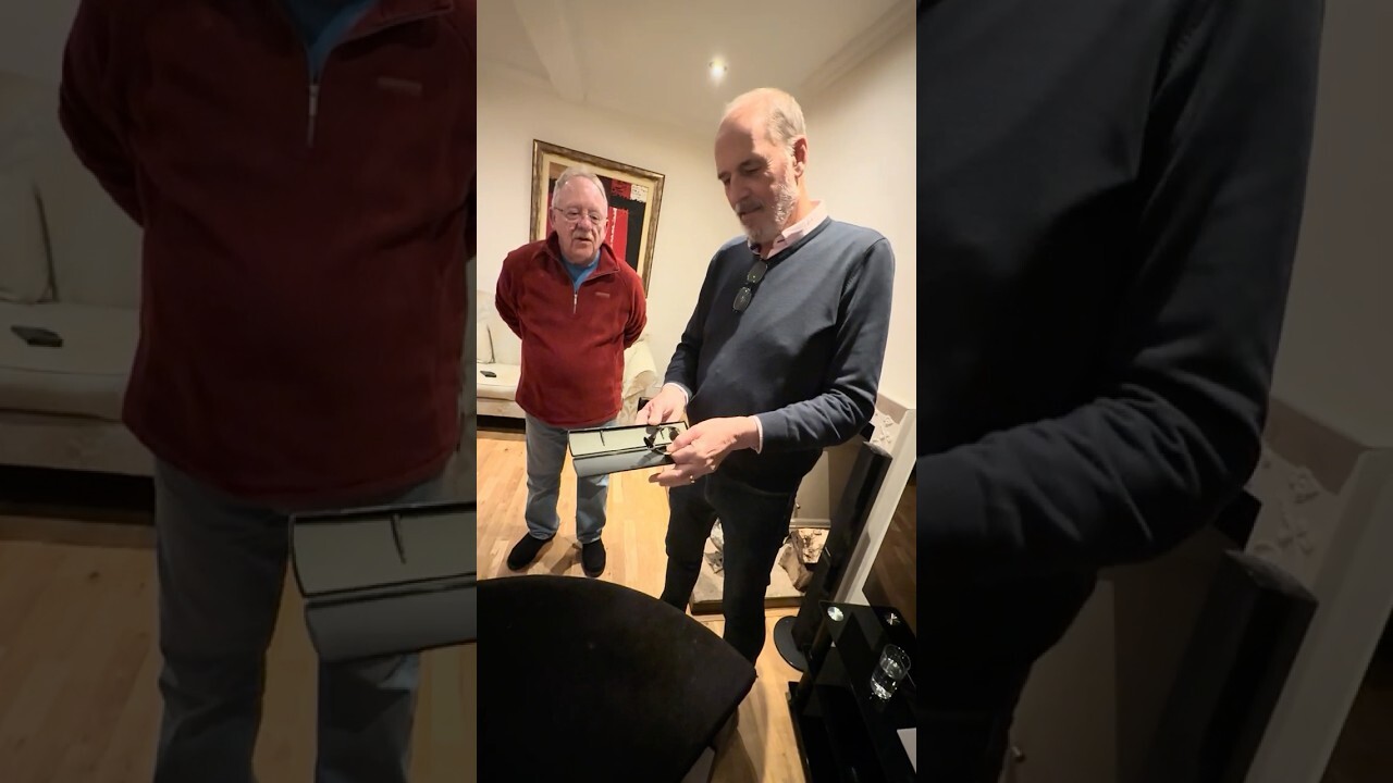 Close-up magician stealing a watch at a house party in Snitterfield, Stratford-upon-Avon