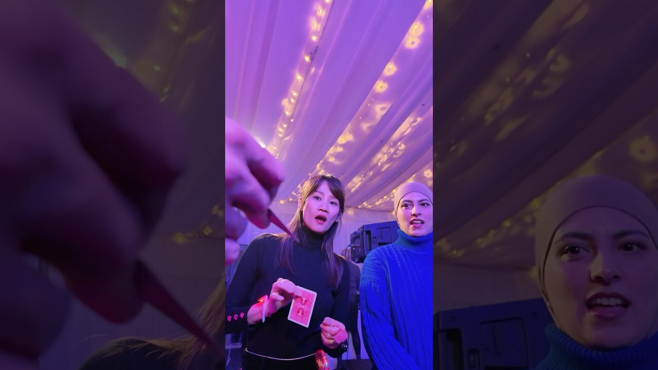 Close-up magician performing at a corporate event in Shropshire