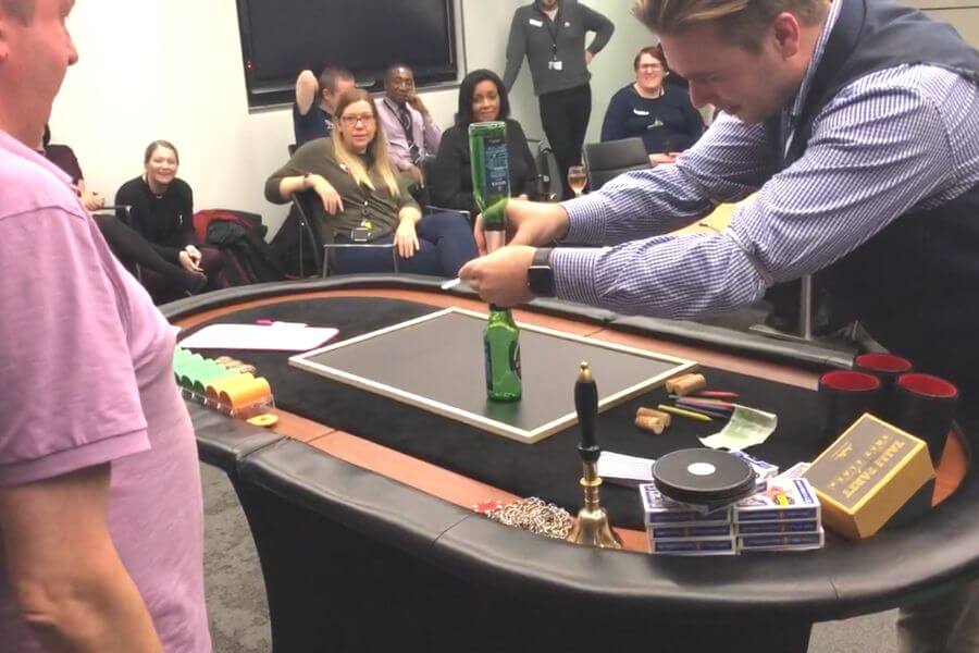 The Crooked Croupier running a card-table workshop for a corporate team