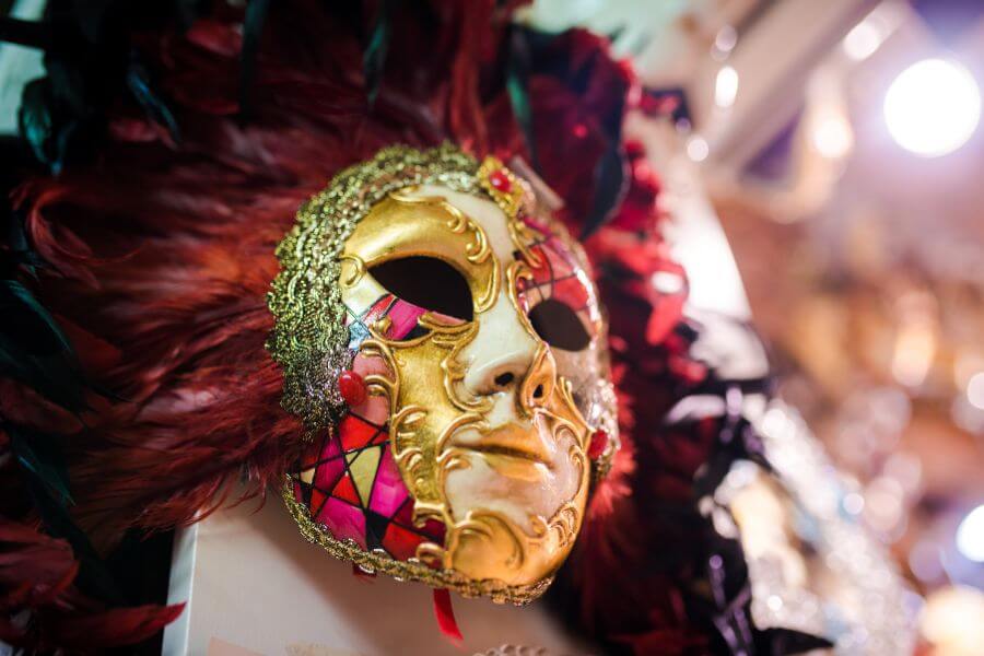 Masquerade ball 50th birthday party with ornate masks