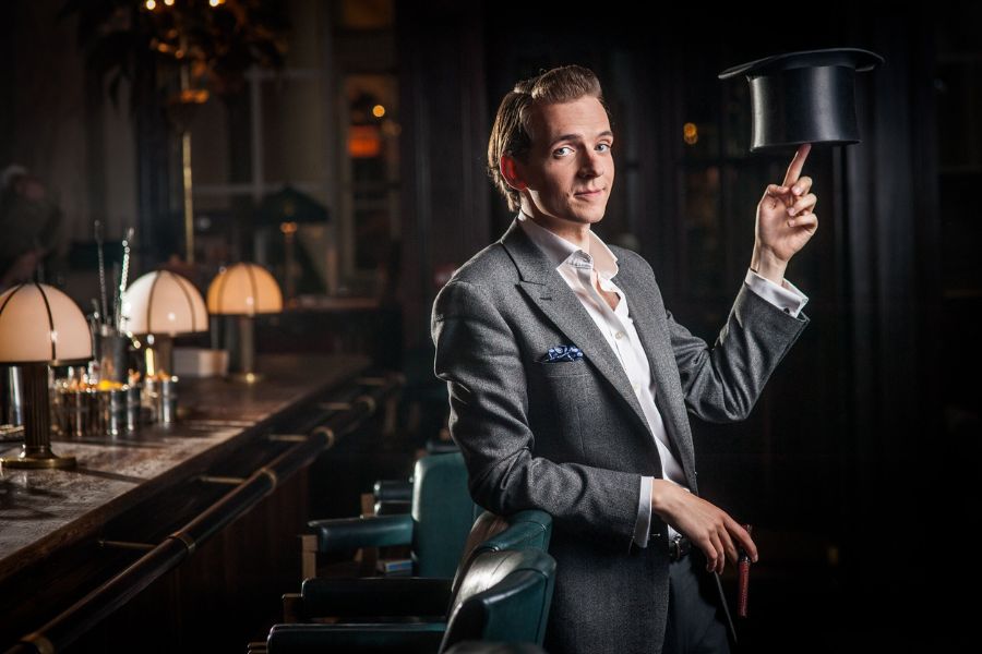 Florian the juggling waiter performing tableside at a London party
