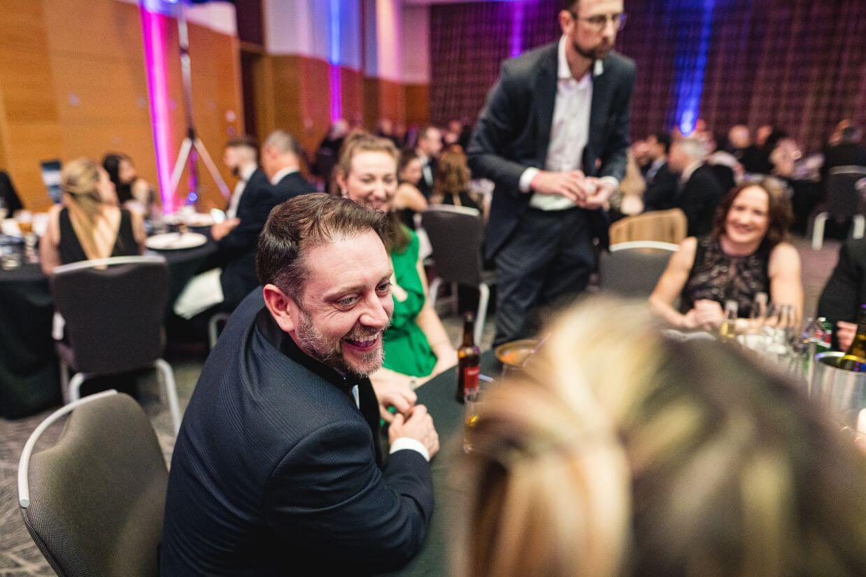 Corporate entertainment magician — jaw-drop reaction