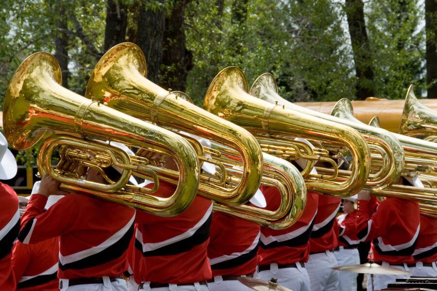 Brass band players in festive attire at a Christmas event