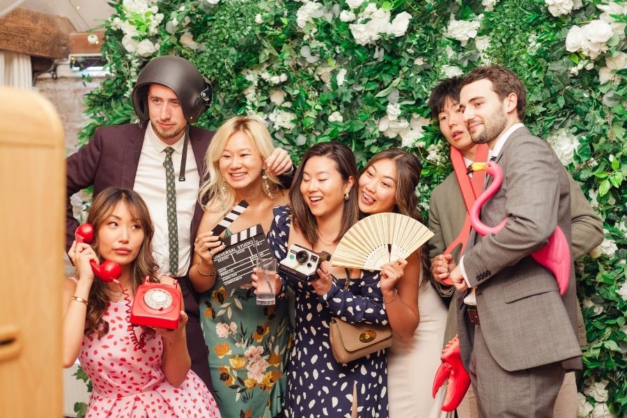 Wedding photo booth setup with props for guests
