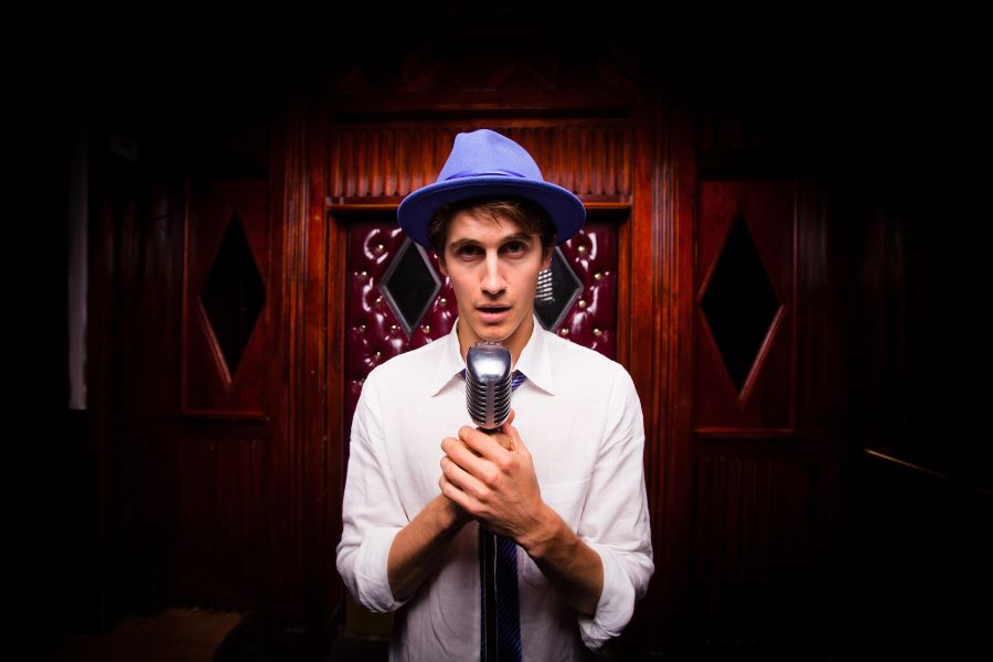 Stand up comedian performing at an office party
