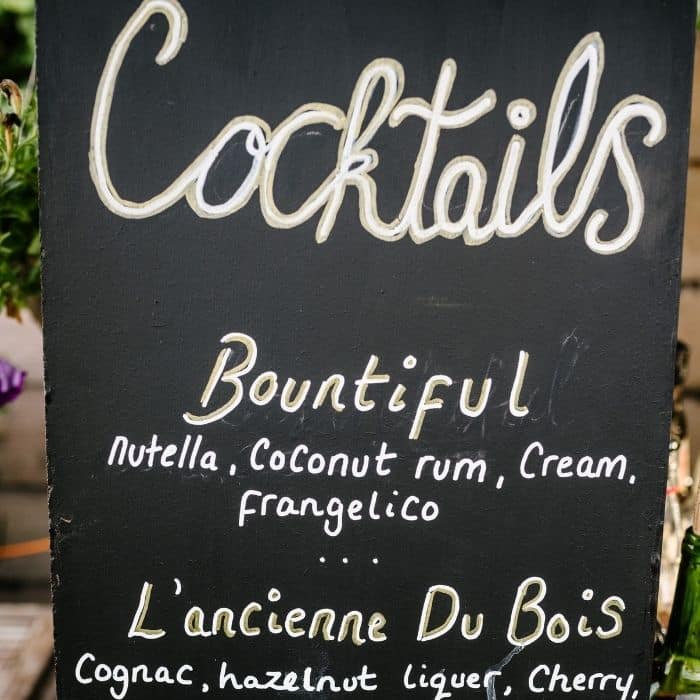 Wedding guests making cocktails during a masterclass