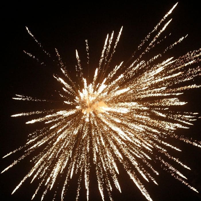 Bride and groom watching their wedding fireworks