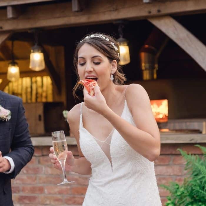 Wedding pizza van serving fresh slices at the evening reception