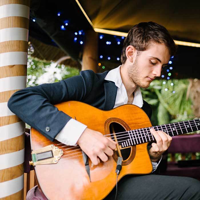 Acoustic wedding guitarist playing during the drinks reception