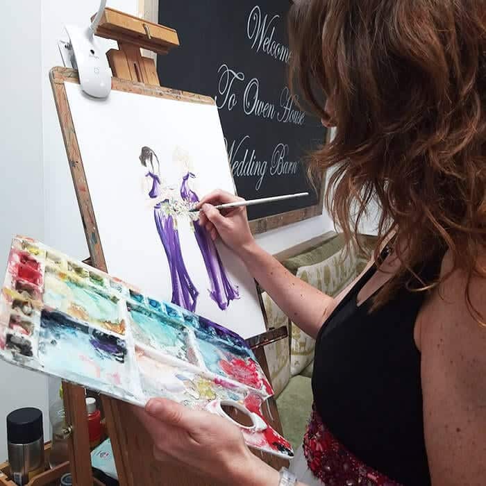 Live wedding artist sketching guests during the reception
