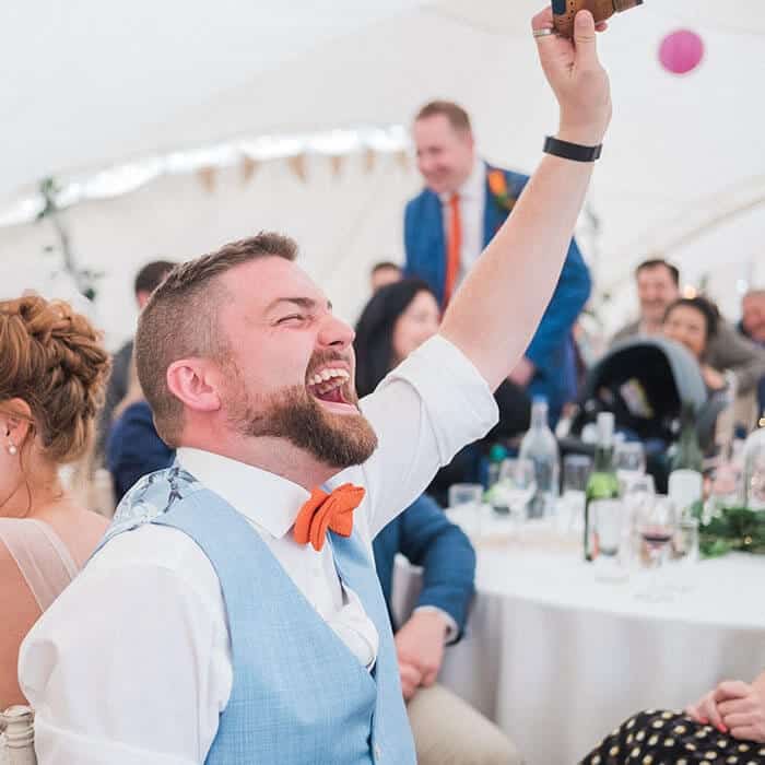Wedding quiz with teams answering questions about the bride and groom