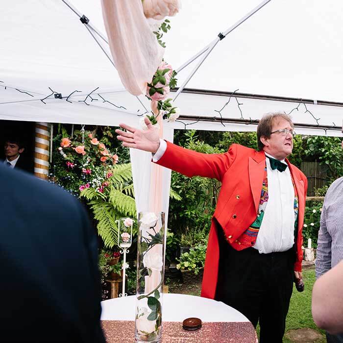 Comedy waiter causing mischief at a wedding reception