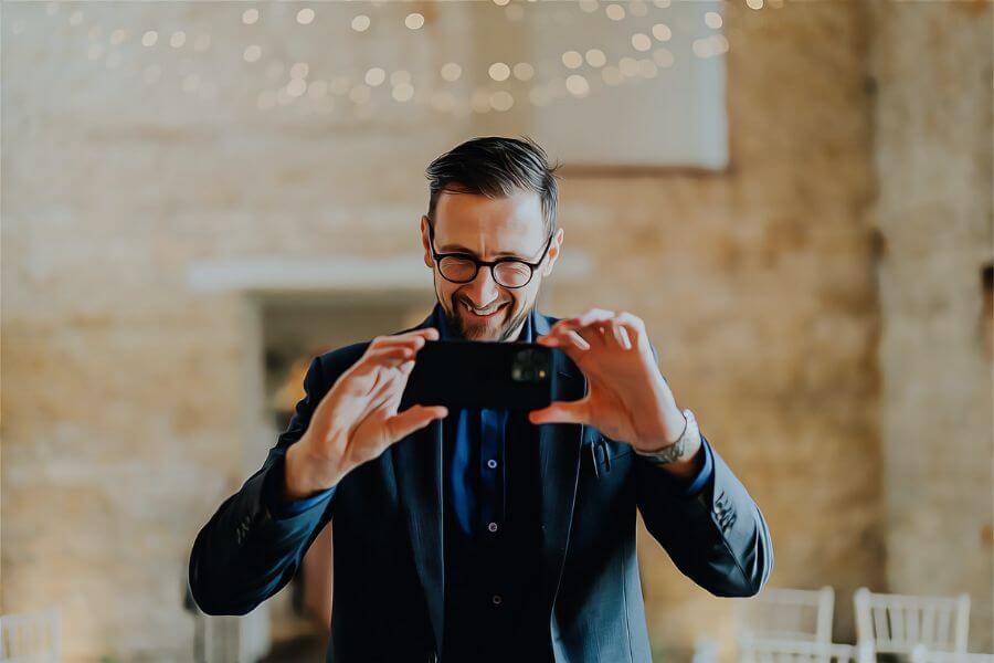 Comedy magician getting laughs from guests during a close-up set