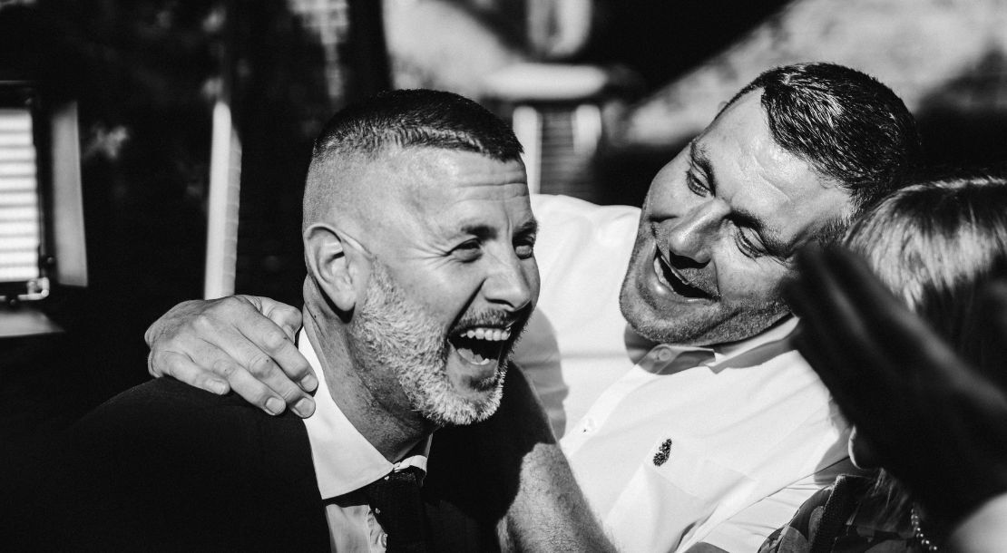 Wedding magician reactions — guests laughing