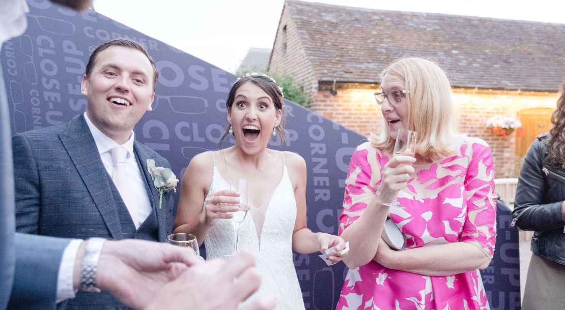 Wedding magician — group reaction at Close-Up Corner