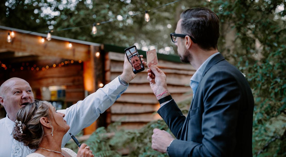 Evening reception entertainment — close-up magician