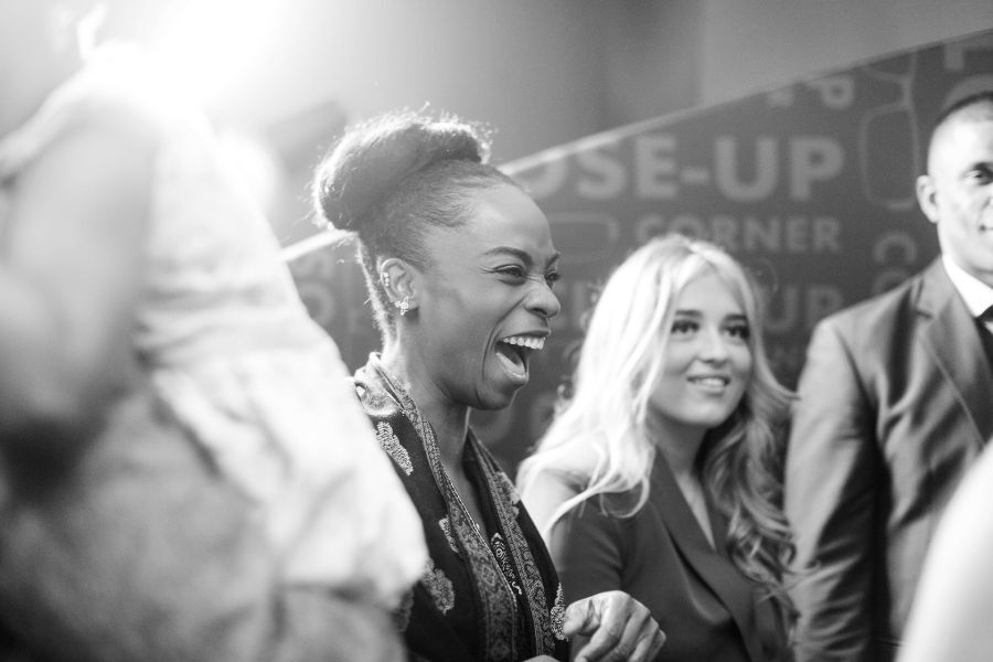 Guests engaged in close-up magic at the Close-Up Corner