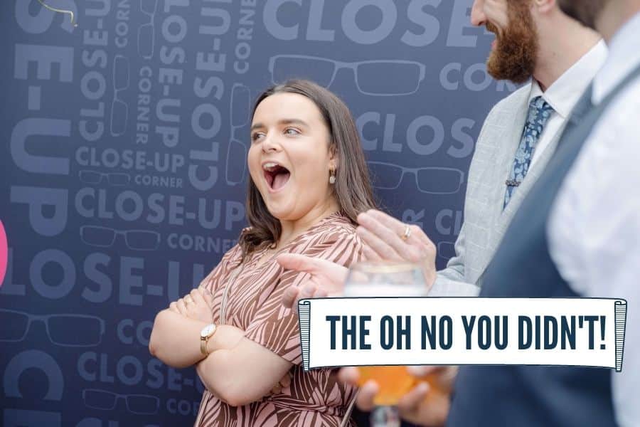 Wedding guest reacting with disbelief to a close-up magic trick