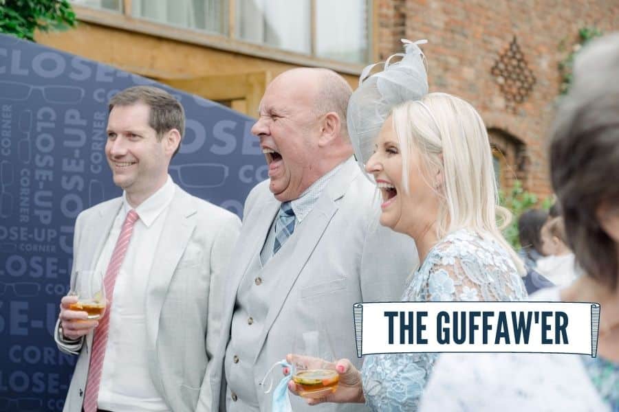 Wedding guest laughing loudly at close-up magic