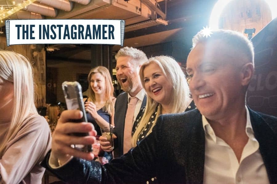 Wedding guest filming close-up magic on their phone
