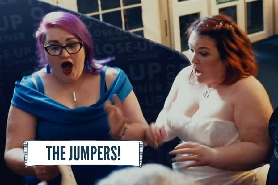 Wedding guest jumping in surprise at a close-up magic trick