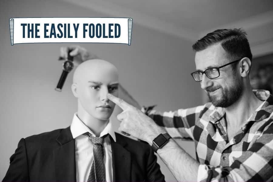 Wedding guest looking the wrong way during close-up magic