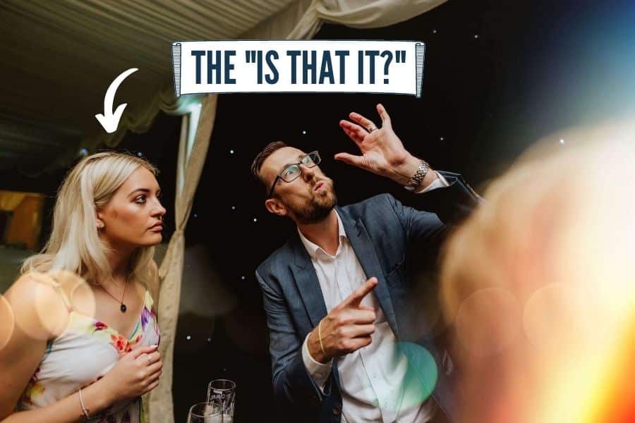 Wedding guest watching close-up magic with high expectations