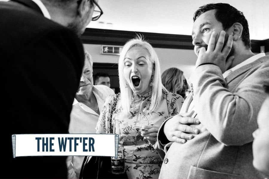 Wedding guest reacting loudly to a close-up magic trick