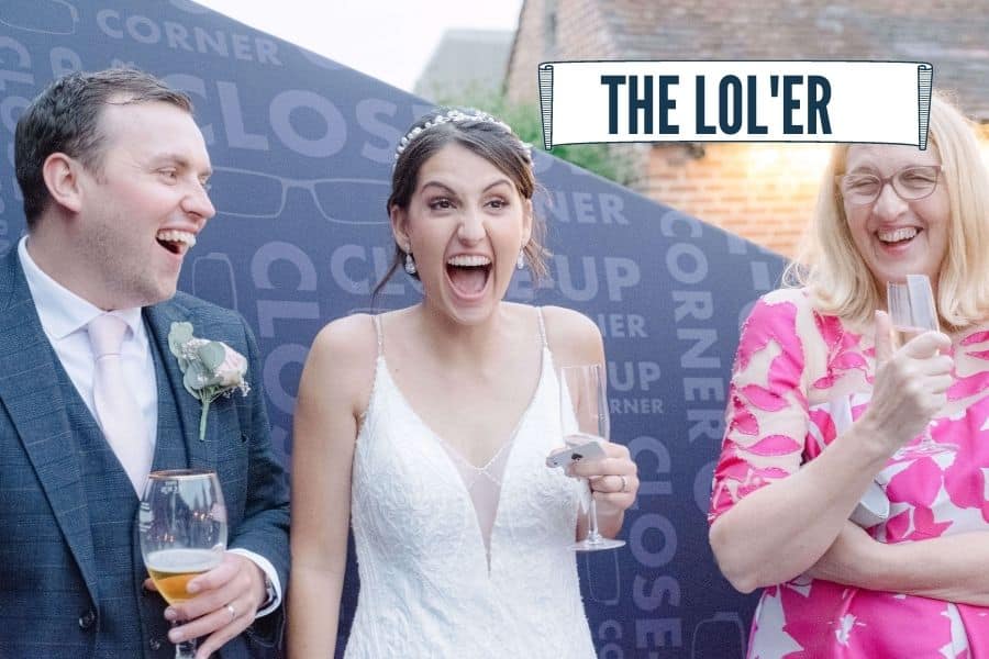 Wedding guest enjoying close-up magic at a wedding reception