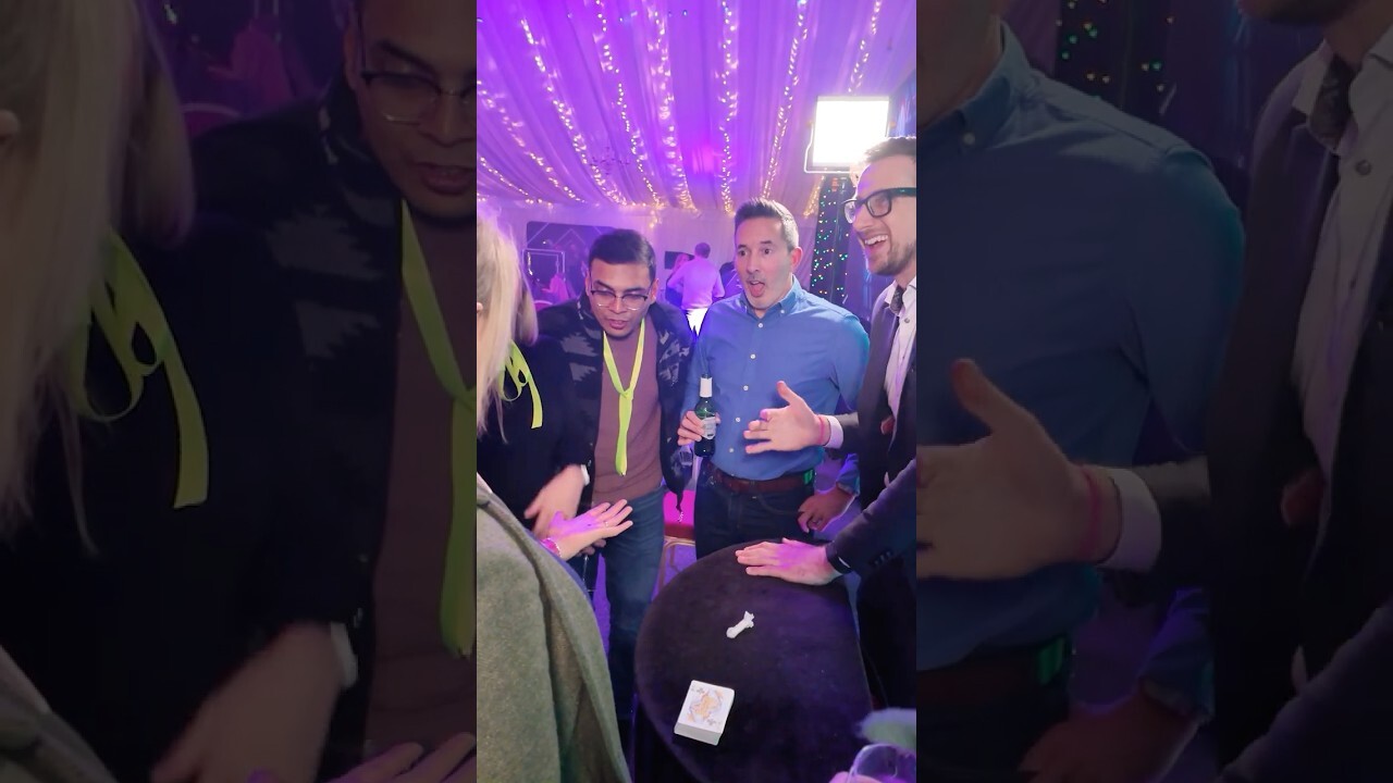 Close-up magician performing at an event in Nottingham