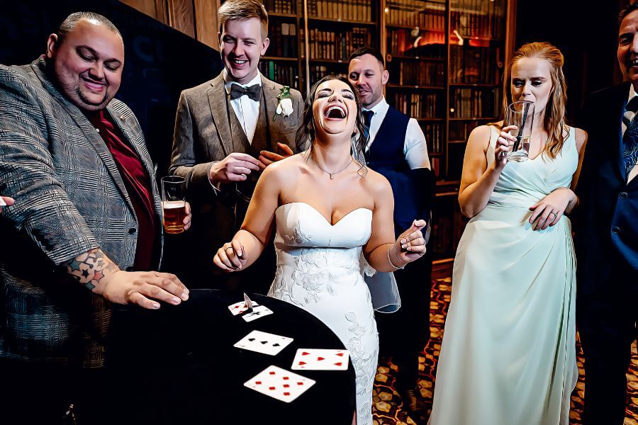 A magician performing for guests during the reception lull