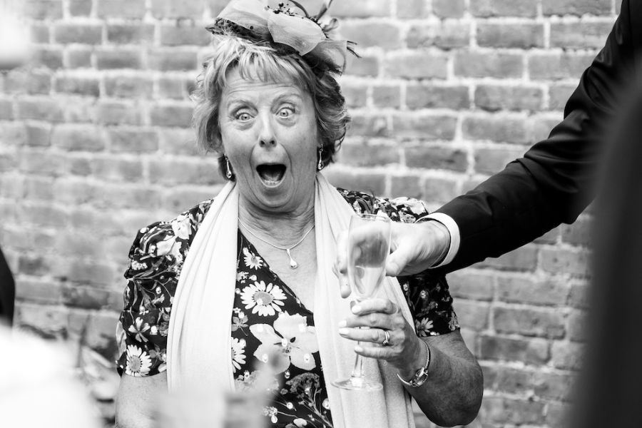 Wedding magician working across multiple moments