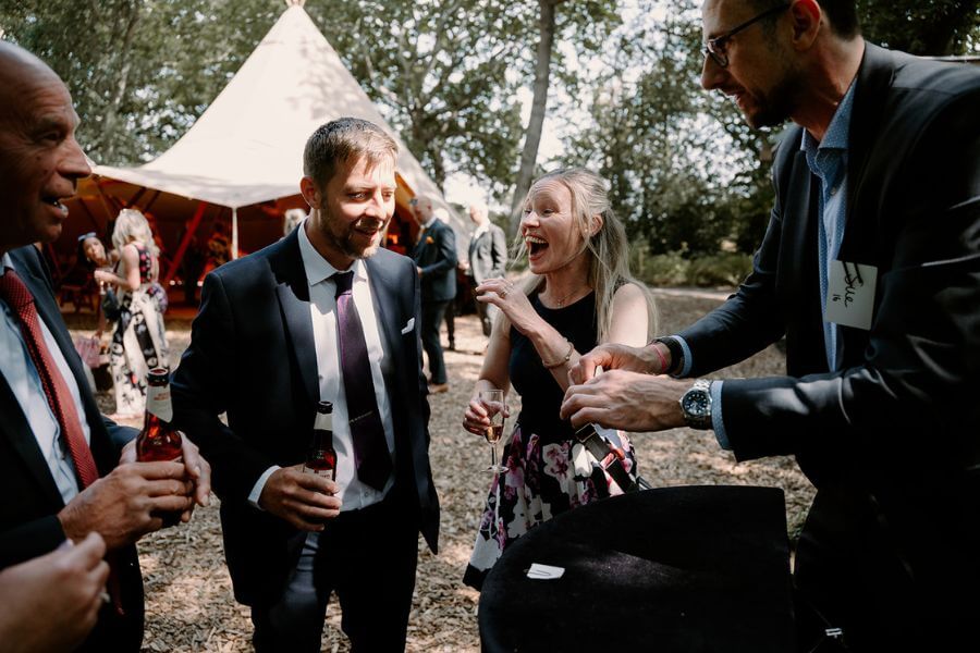 Wedding guest reaction to a close-up magic reveal