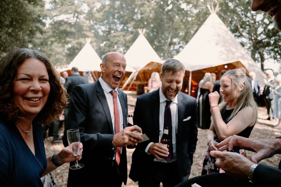 Close-up magic reactions at a wedding table