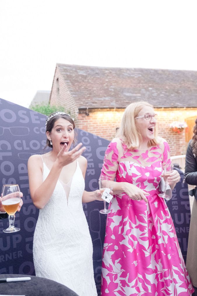 Wedding guest reacting to a magic reveal