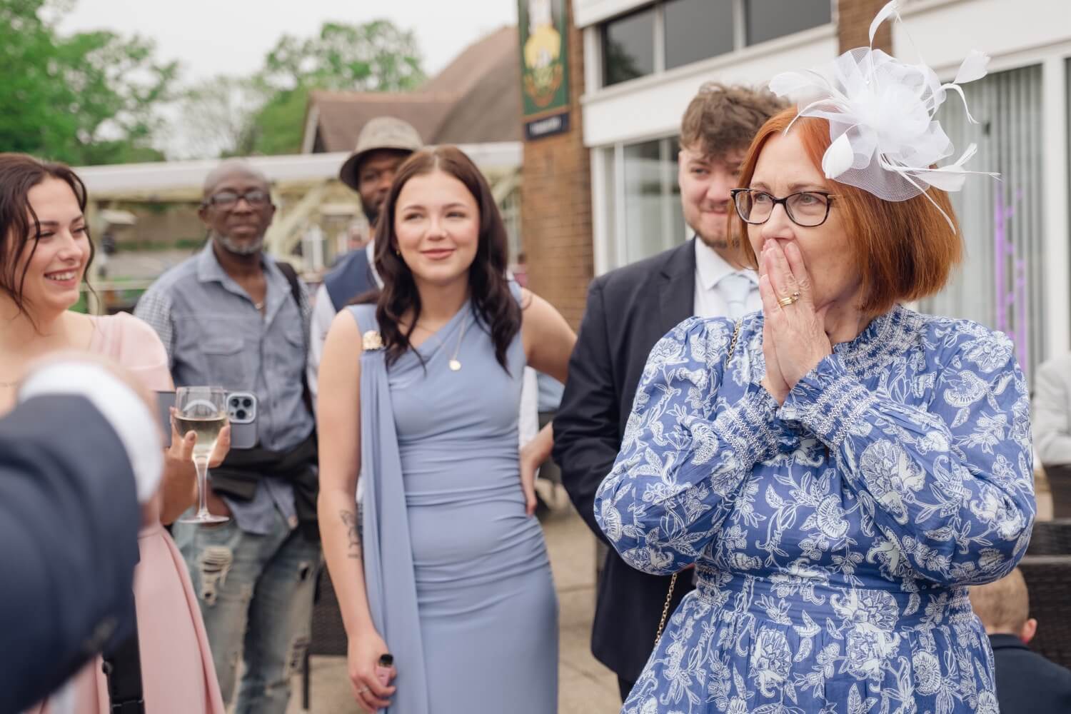 Ruth watching close-up magic for the first time at the Harborne Golf Club drinks reception