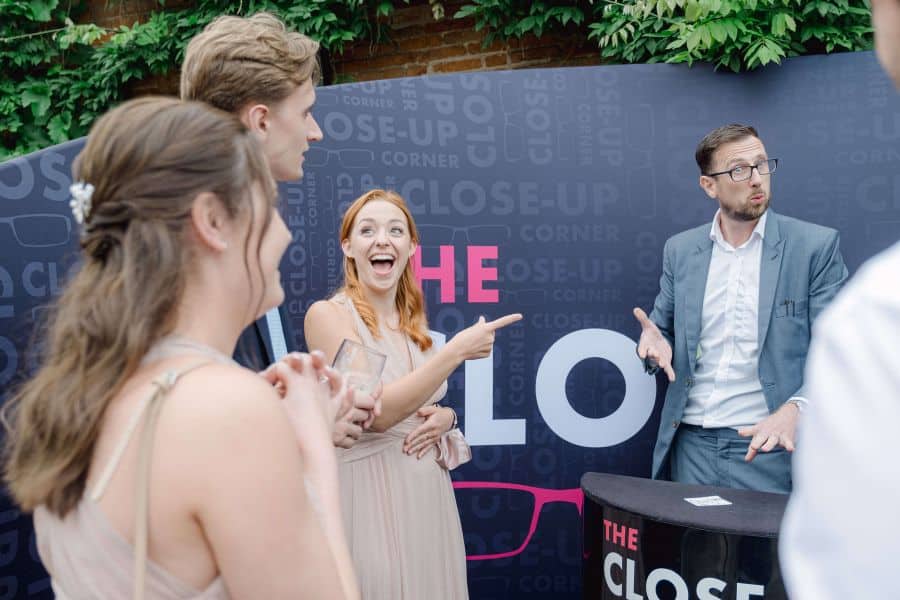 laughing bridesmaid and magician