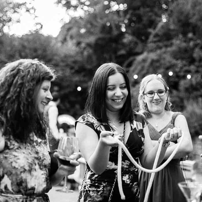 laughing wedding guests