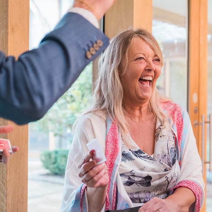 wedding guests laughing