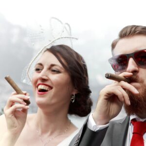 bride and groom smoking cigar