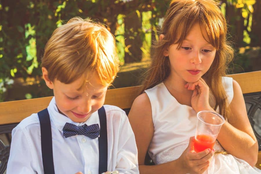 Children playing together at a wedding reception