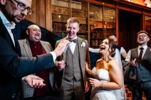 wedding magician entertaining happy couple