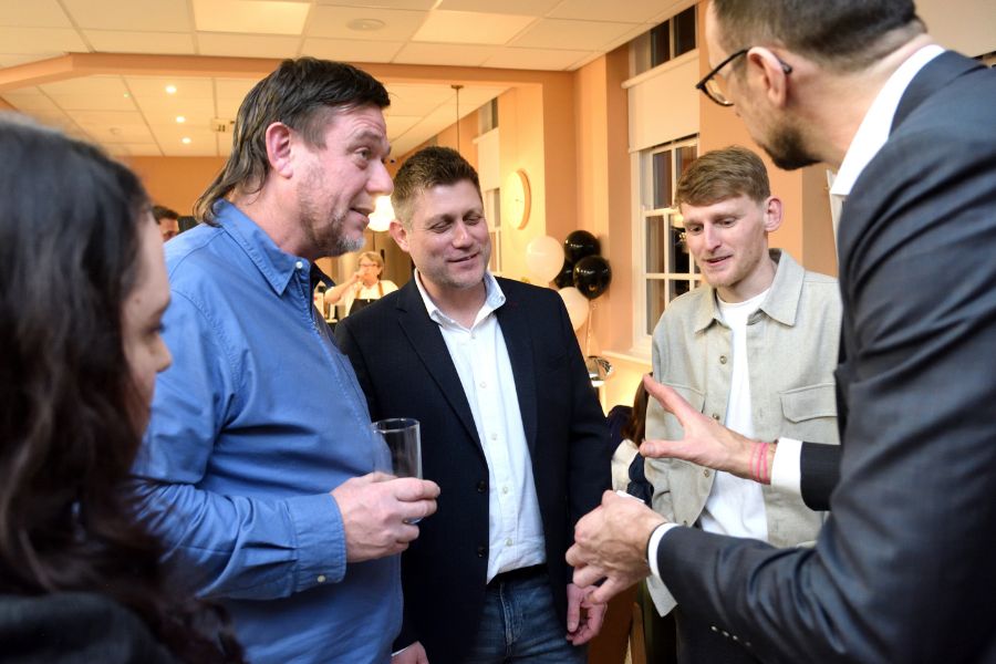 Guests watching close-up magic at the Co-Founded Shrewsbury launch