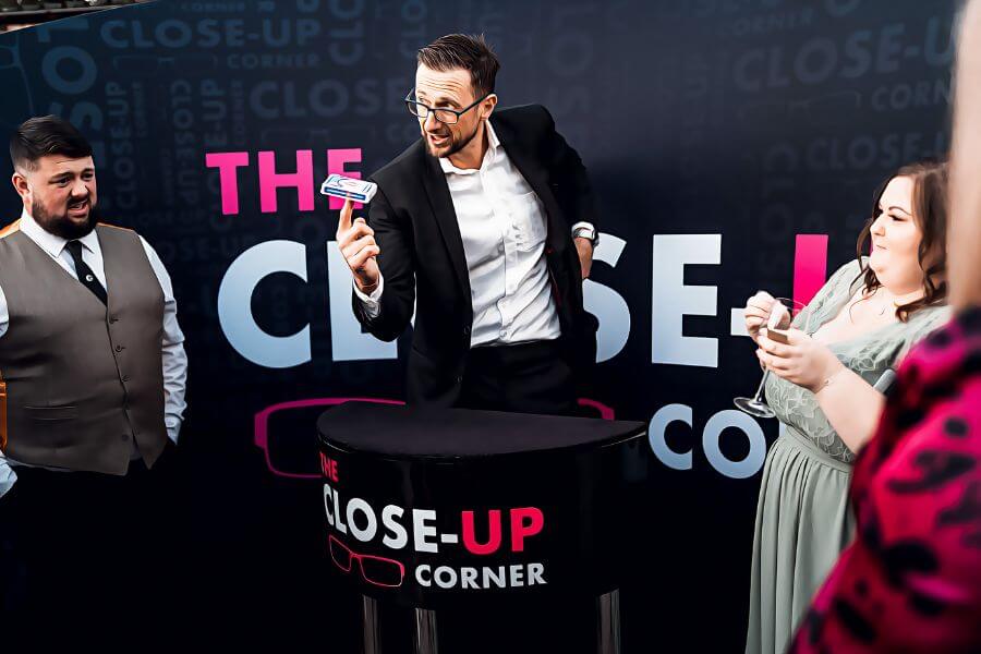 The Close-Up Corner focal-point magic booth at a corporate event