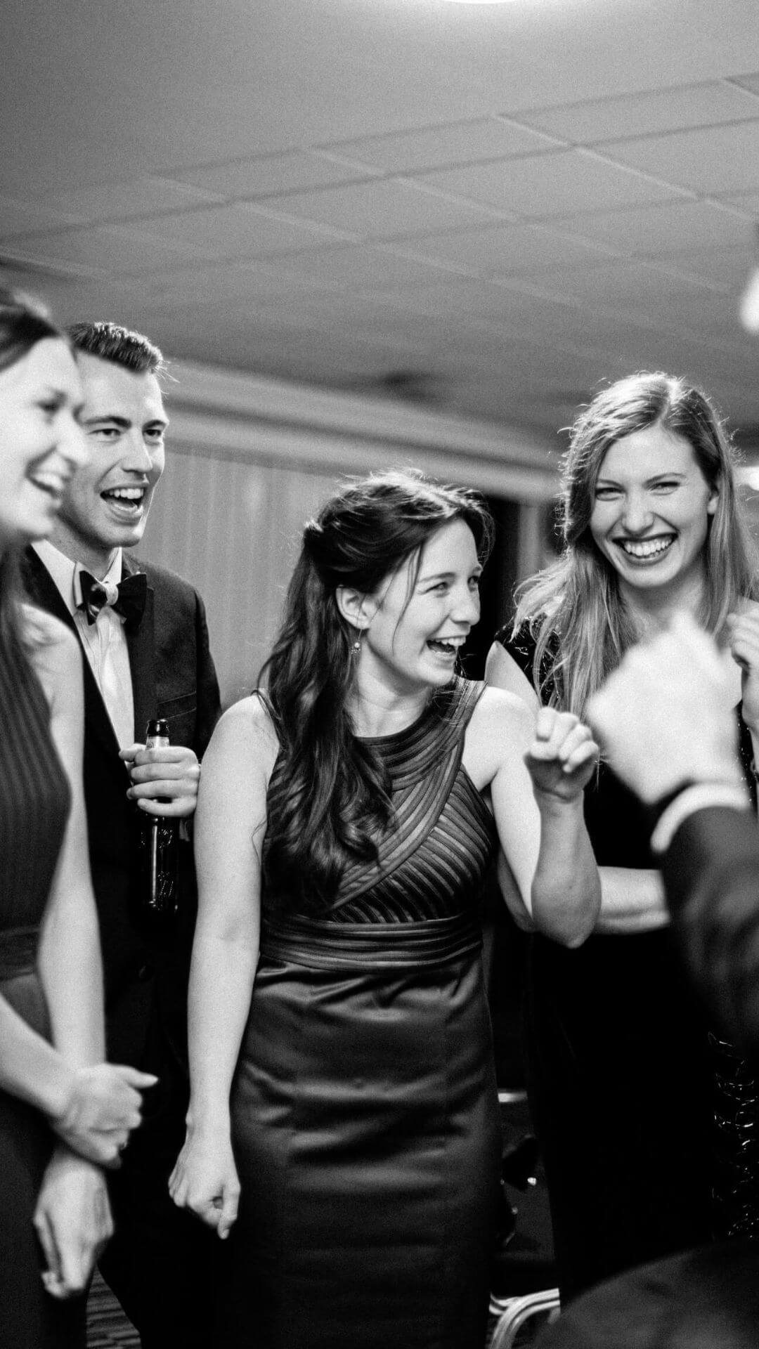 Guests reacting to a private close-up magic show