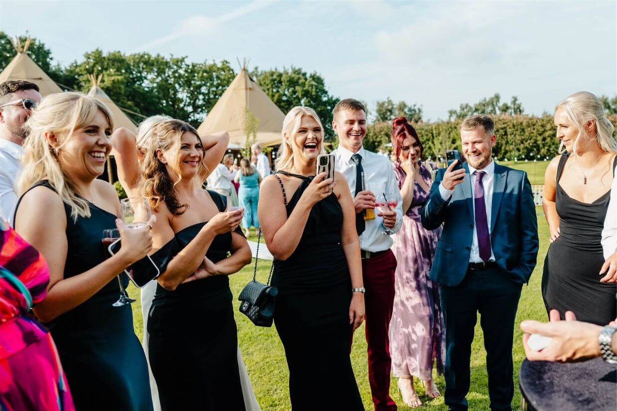 Close-Up Chris performing close-up magic for wedding guests